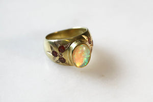 Gold Signet Ring with opal center stone and 6 orange sapphires